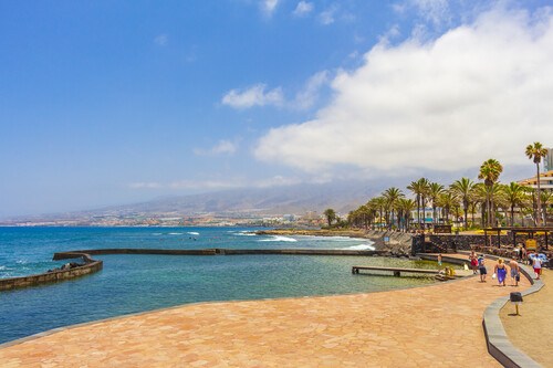 Tenerife Spain 12. July 2014 Landscape and beach promenade panorama of Playa de las Americas of Canary Spanish island Tenerife in Africa.