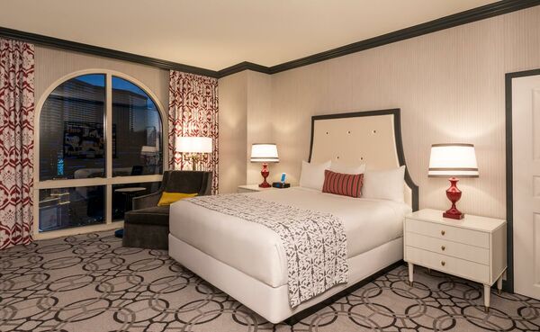 A standard king size bedroom at the Paris casino-hotel is seen on
